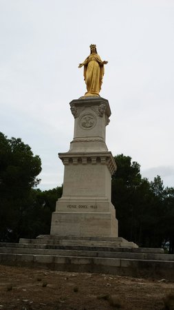 statue on top of hill