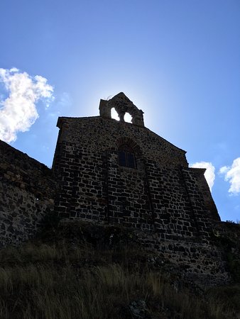 sun behind the chapel